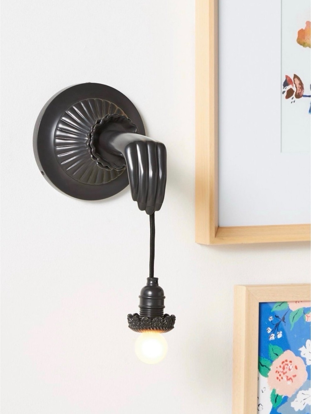 Anthropologie Lightbearer wall sconce in black. SOLD OUT ONLINE